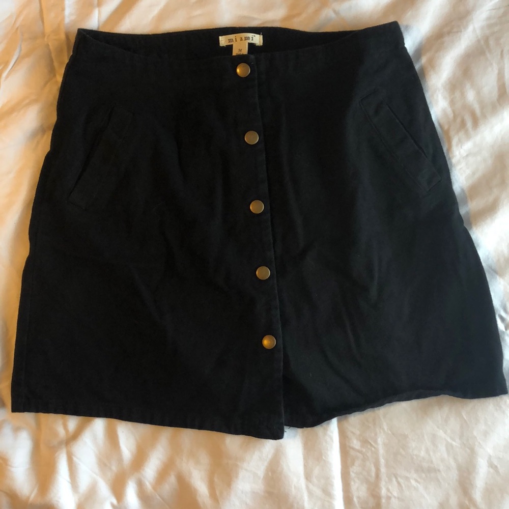 Francesca’s black button up skirt